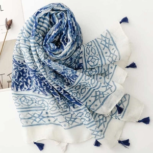 Blue and white porcelain style lightweight scarf with tassels and geometric floral pattern