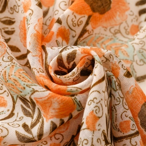Floral cotton linen scarf in orange and blue with vintage vine pattern and tassels