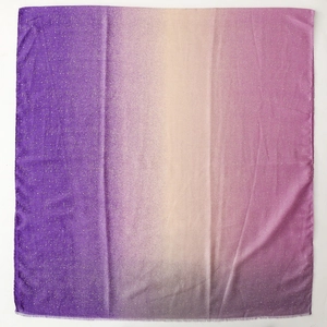 Macro detail of purple gradient cotton-linen scarf with shimmering gold foil stardust