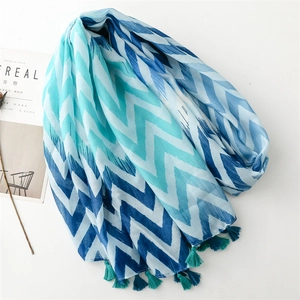 Detail of blue and green chevron cotton linen scarf with soft fringe tassels