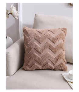 Detail of plush square pillow case with brown wave texture and Nordic minimalist style