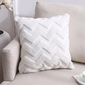 Nordic white plush decorative pillow with embossed wave texture on a soft fabric sofa