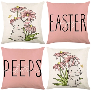 Set of four Easter pillow covers with cute rabbit prints and festive pink daisy designs