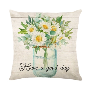 Floral throw pillow cover with daisy illustration and Have a Good Day text on wood texture
