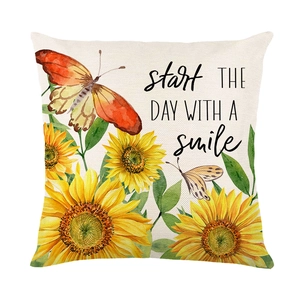 Funda de cojín de girasol con mariposas y frase motivadora start the day with a smile