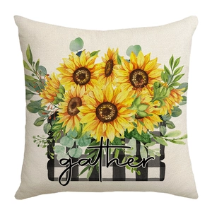 Housse de coussin tournesol avec texte gather dans un panier à carreaux