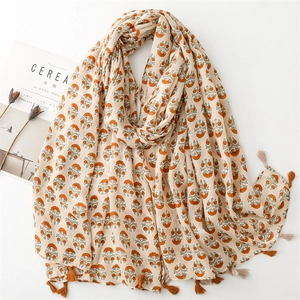 Linen-touch floral scarf with vintage flower print and tassels on a white background