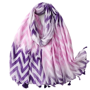 Linen feel chevron pattern scarf with fringe trim in purple and pink tones