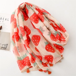 Lightweight strawberry print linen scarf with fringes and vibrant red fruit patterns