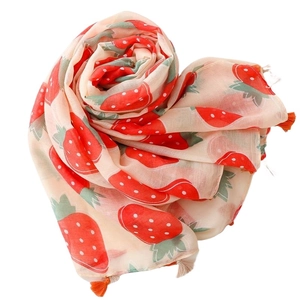 Lightweight cotton-linen scarf with red strawberry prints and fringe tassels