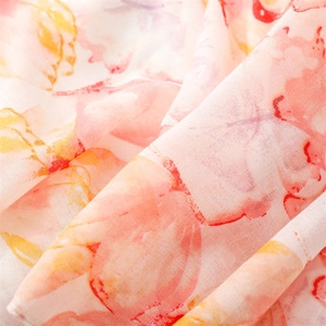 Detailed macro shot of Chinese style ink flower print on lightweight chiffon shawl fabric