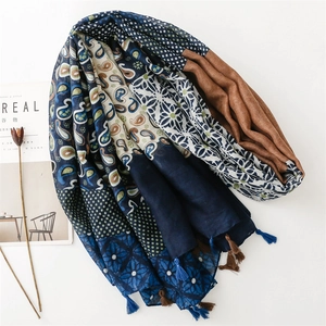 Vintage paisley and geometric patchwork scarf with tassels for sun protection travel