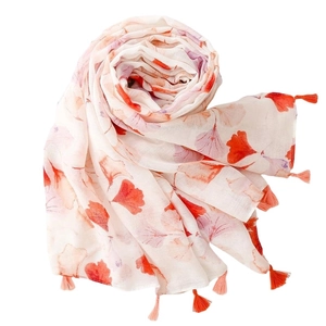 Elegant ginkgo leaf print scarf with orange tassels for sun protection and travel