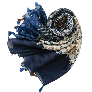 Bohemian paisley and floral print scarf with tassel trim for summer travel and styling