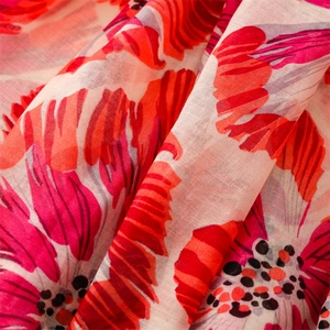 Detailed view of red floral voile scarf showing breathable cotton linen fabric texture