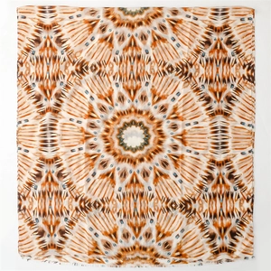 Detail of square scarf with gold foil geometric pattern and soft cotton-linen touch