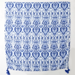 Blue and white tie-dye cotton-feel shawl with elegant tassels for travel styling