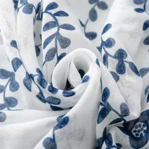 Blue floral print cotton linen scarf with vintage botanical pattern on white fabric