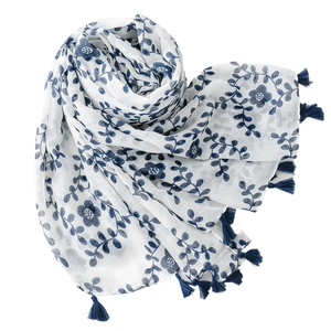 Lightweight white linen scarf with vintage blue floral prints and tassel fringe