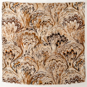 Close-up of fringe detail and artistic fan-shaped marble pattern on cotton linen scarf