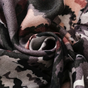 Macro shot of abstract pattern textile showing soft cotton-linen texture and woven detail