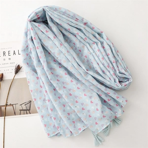 Light blue cotton-linen scarf with pink heart prints and tassels for sun protection