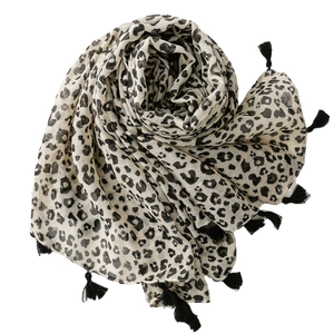 Écharpe léopard beige avec pompons noirs et sensation douce en coton et lin pour femme