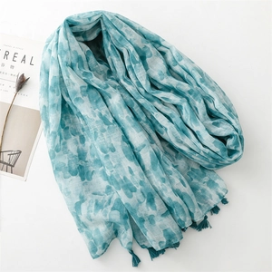 Blue and white abstract tie-dye cotton-linen scarf with fringe trim for sun protection