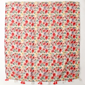 Pink floral print scarf with elegant red and white tassels for beach sun protection