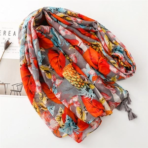 Tropical fruit pineapple print scarf with gray fringe and colorful leaf patterns