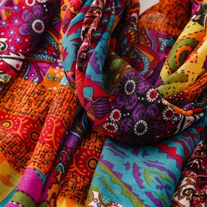 Close-up of colorful Bohemian paisley print shawl with intricate folk pattern textures