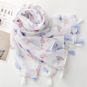 White cotton linen scarf with blue and purple butterfly prints and tassel edges