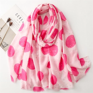 Pink cotton linen scarf with red polka dots and gold foil accents with frayed edges