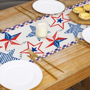 Independence Day table runner with red, blue, and white star pattern on a wooden table