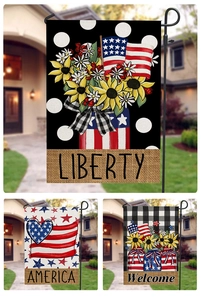 Detailed close-up of Independence Day garden flags with Liberty and America text