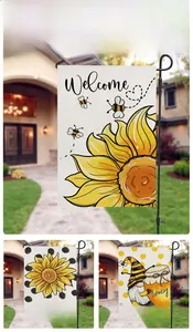 Detailed view of polyester garden flags featuring vibrant sunflower and bee gnome prints