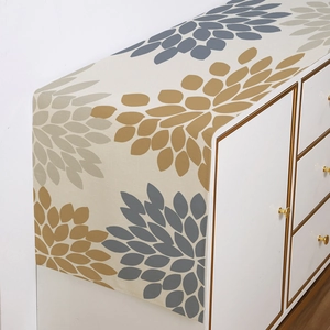Morandi style polyester table runner with modern floral patterns on a white cabinet