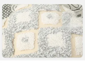 Close-up of high-end tufted design with 3D texture on beige cotton pillow cover