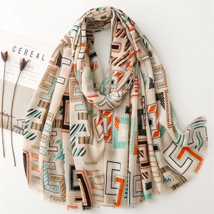 Summer cotton linen scarf with geometric colorful prints and fringe edges for women