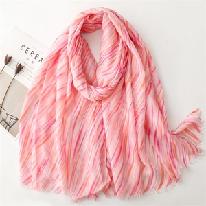 Lightweight pink and orange gradient marble print scarf with delicate fringed edges