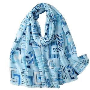 Light blue cotton linen scarf with geometric patterns and soft frayed edges for women