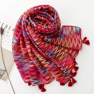 Artistic wave-patterned shawl with red tassels and lightweight breathable fabric