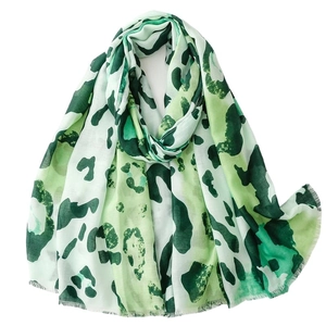 Green leopard print lightweight cotton-linen scarf for women with elegant frayed edges