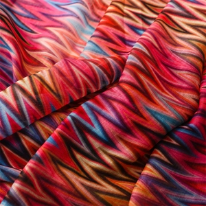 Close-up of colorful zigzag print fabric with lightweight and translucent texture