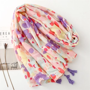 Artistic abstract print scarf with macaron-colored patterns and purple tassels