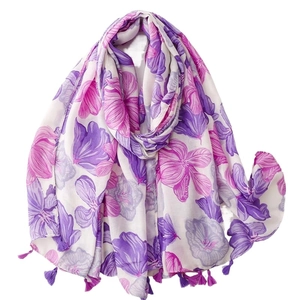 Lightweight floral scarf with large purple flowers and elegant tassel edges on white background