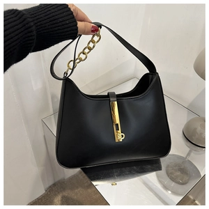Detail of black matte PU leather handbag featuring a stylish gold chain and metal buckle