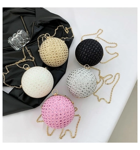 Collection of spherical evening clutch bags with sparkling rhinestones and metal chain straps