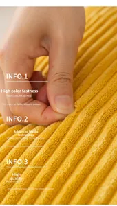 Macro shot of yellow corduroy cushion cover fabric showing soft striped texture