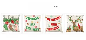 Detail view of four Christmas pillow covers with reindeer and festive holiday greetings